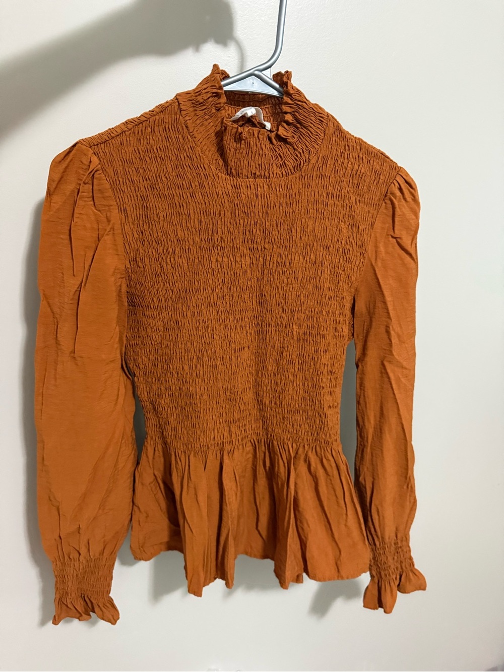 Rust Smocked Peplum Long-Sleeve Top